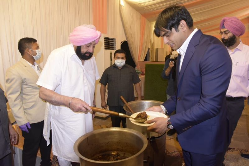 FROM COOKING DELICACIES TO PERSONALLY SERVING THEM, HE DID IT ALL – CAPT AMARINDER HOSTS OLYMPIANS FOR DINNER